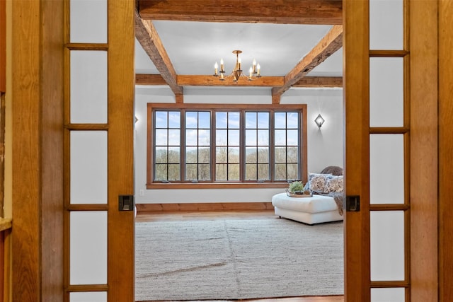 5 Shingle House Rd, Millwood, NY 10546 - interior space with beamed ceiling and an inviting chandelier