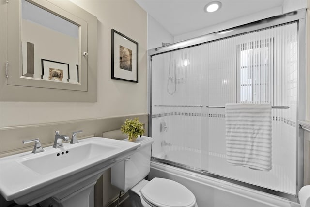 5 Shingle House Rd, Millwood, NY 10546 - bathroom with recessed lighting, bath / shower combo with glass door, a sink, and toilet