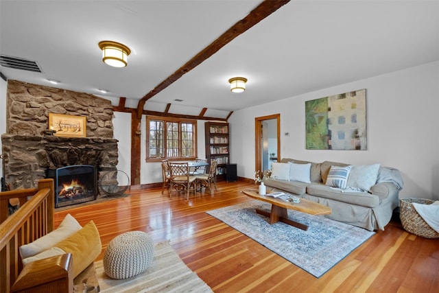 5 Shingle House Rd, Millwood, NY 10546 - living room with visible vents, wood finished floors, a fireplace, beamed ceiling, and baseboards