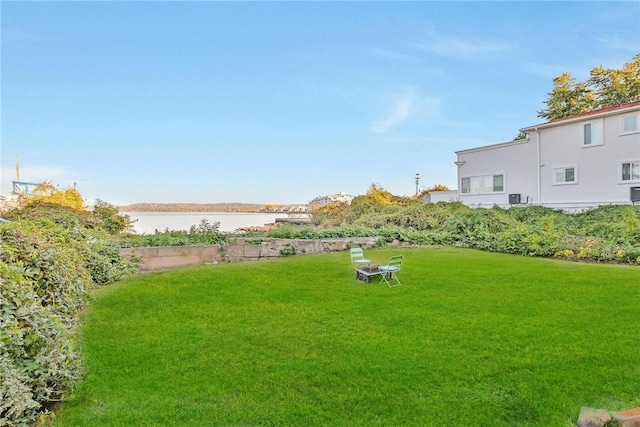 view of yard with a water view