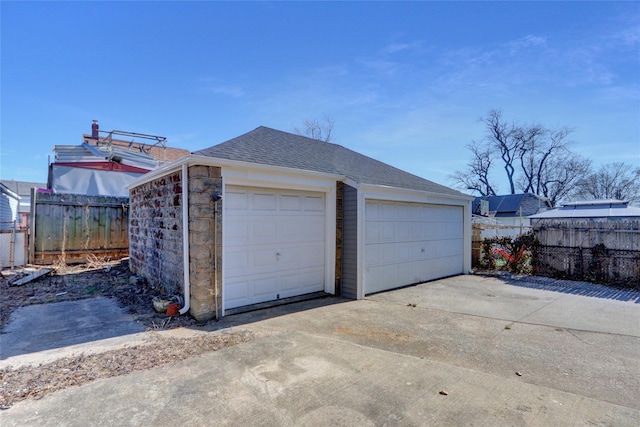 detached garage with fence