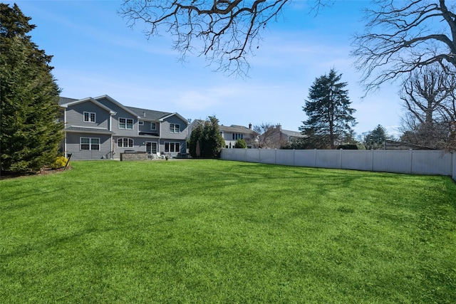 view of yard with fence