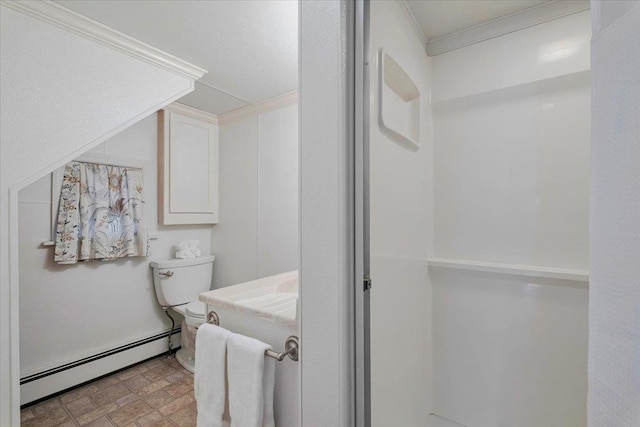 bathroom with toilet and a baseboard radiator