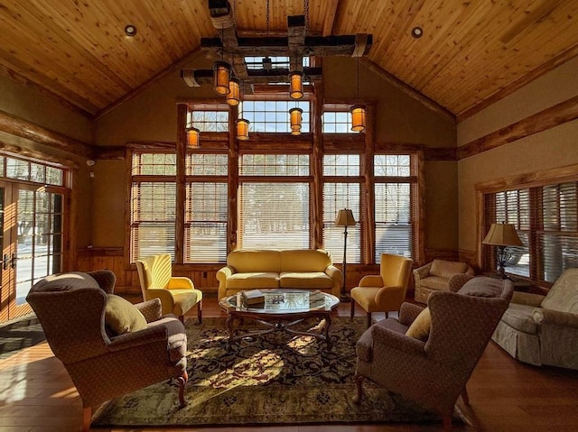 living room featuring high vaulted ceiling, hardwood / wood-style floors, and wood ceiling