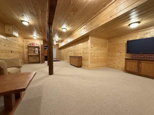 interior space with wooden ceiling, light colored carpet, and wooden walls