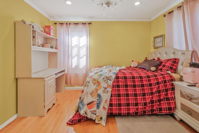 bedroom featuring light wood-style flooring, ornamental molding, baseboards, and recessed lighting