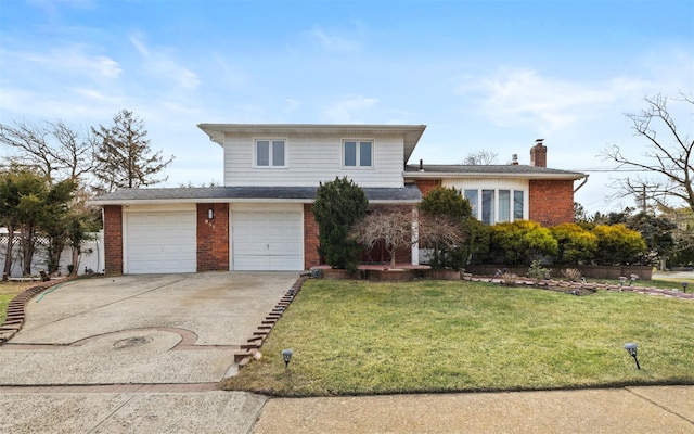 split level home featuring brick siding, driveway, a chimney, and a front lawn