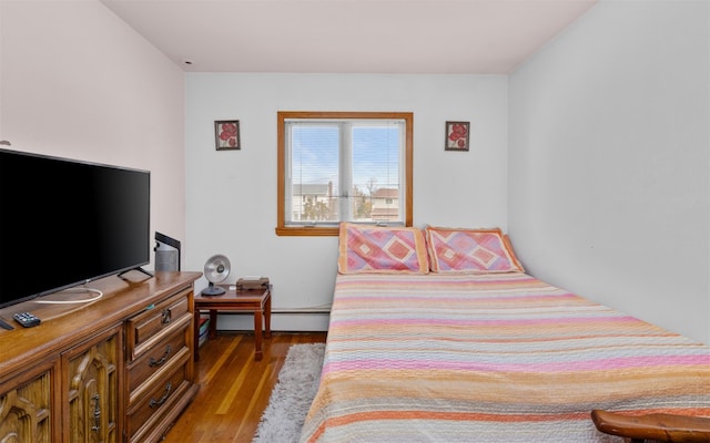 bedroom featuring wood finished floors