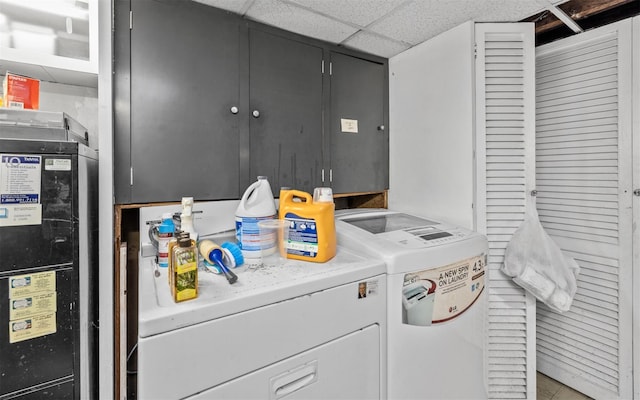 clothes washing area with washer and dryer