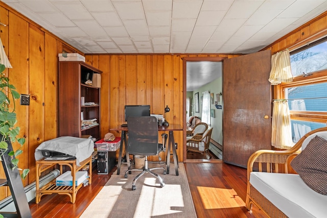 office with wood walls and wood finished floors