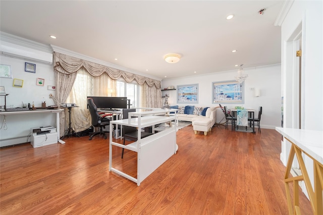 kitchen featuring recessed lighting, crown molding, baseboards, and wood finished floors