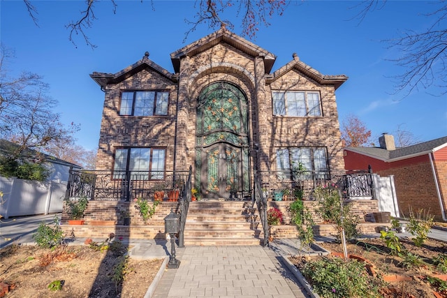 view of front of home featuring a tiled roof