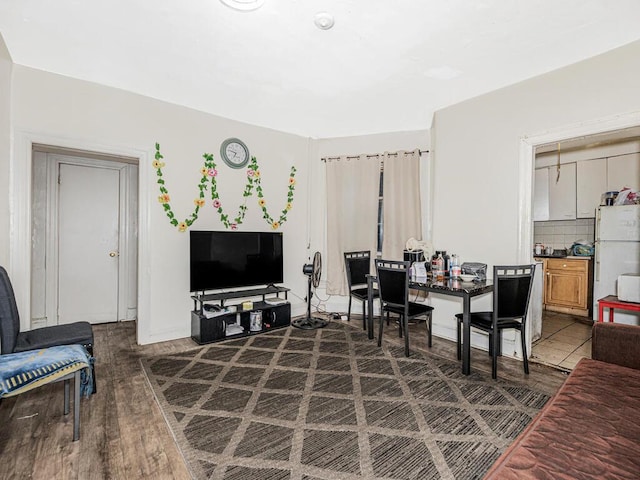 living area with wood finished floors