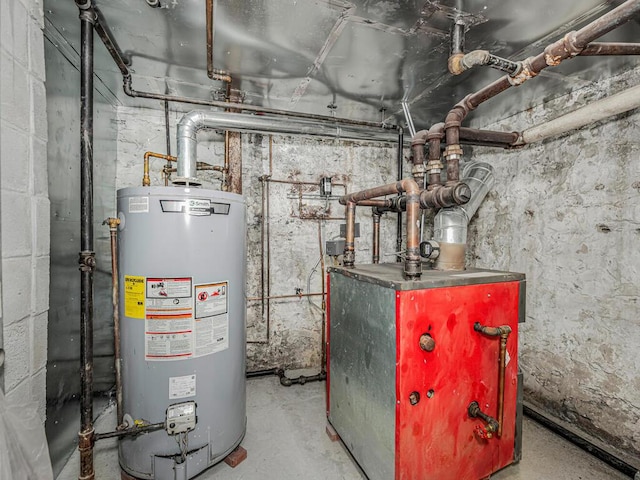 utility room featuring gas water heater and a heating unit