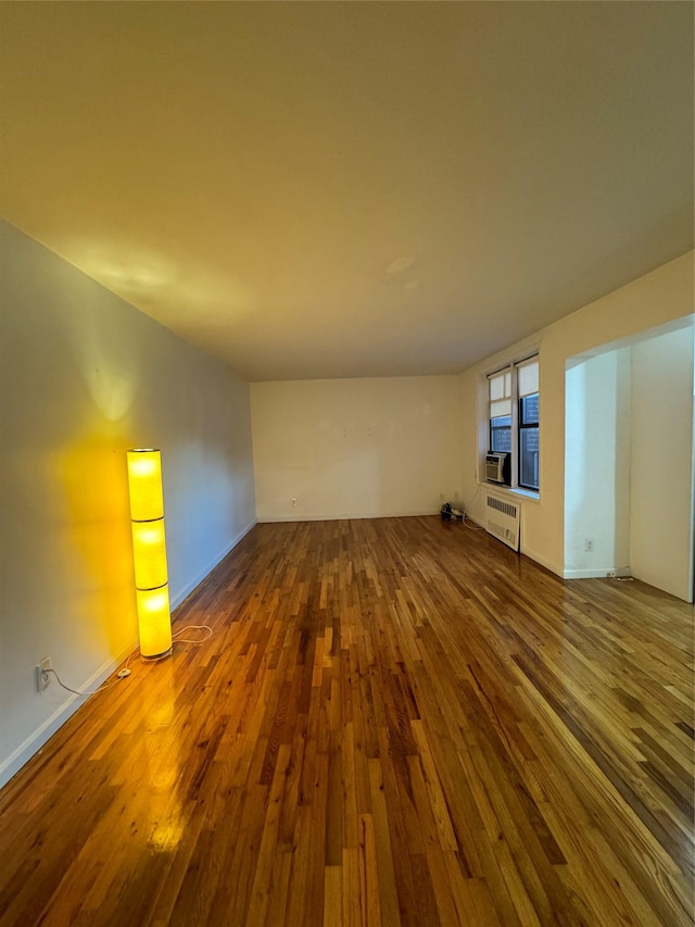 2860 Bailey Ave Unit 7L, Bronx, NY 10463 - spare room with dark wood finished floors and cooling unit