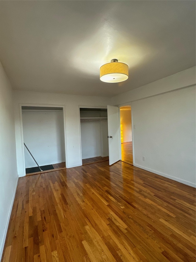2860 Bailey Ave Unit 7L, Bronx, NY 10463 - unfurnished bedroom with multiple closets and wood finished floors