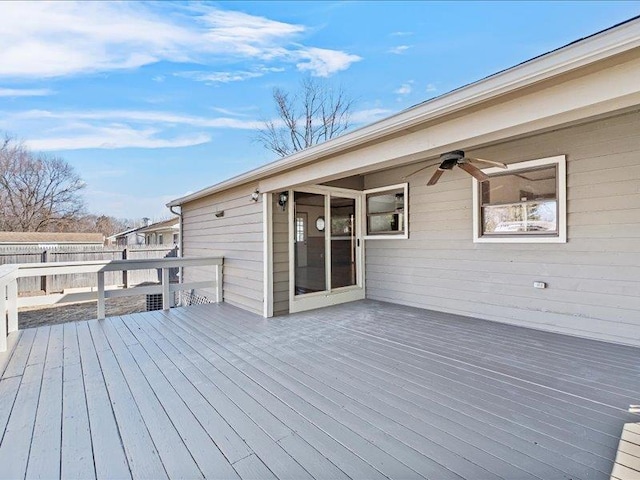 wooden deck featuring fence and ceiling fan