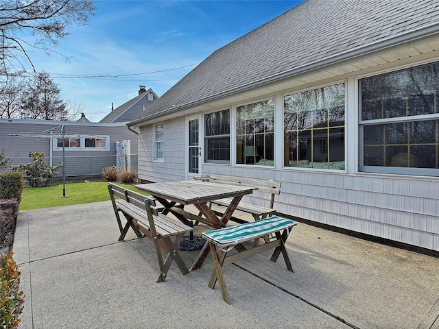 view of patio featuring outdoor dining area