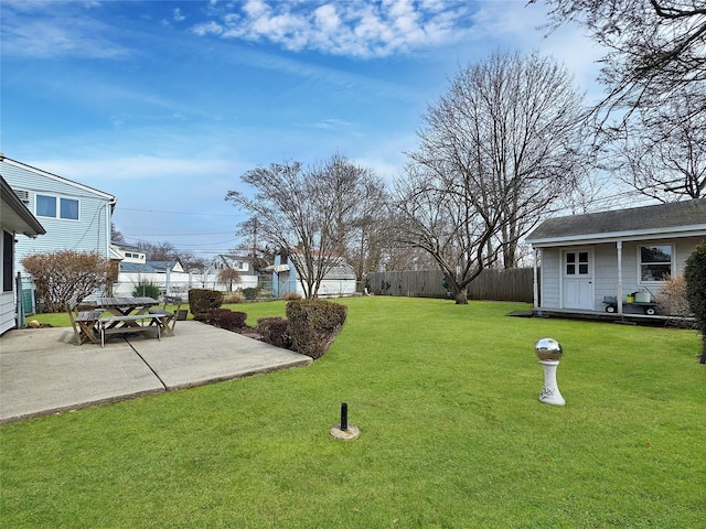 view of yard featuring a patio and fence