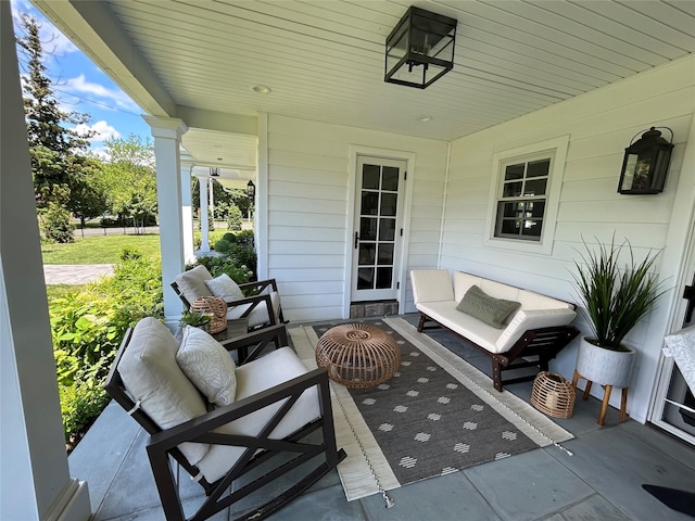 view of patio / terrace with a porch and outdoor lounge area