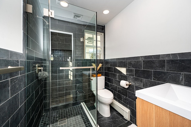 full bath featuring a baseboard radiator, a shower stall, toilet, and tile walls