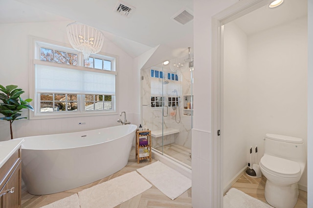 full bath featuring a soaking tub, visible vents, toilet, a stall shower, and a chandelier