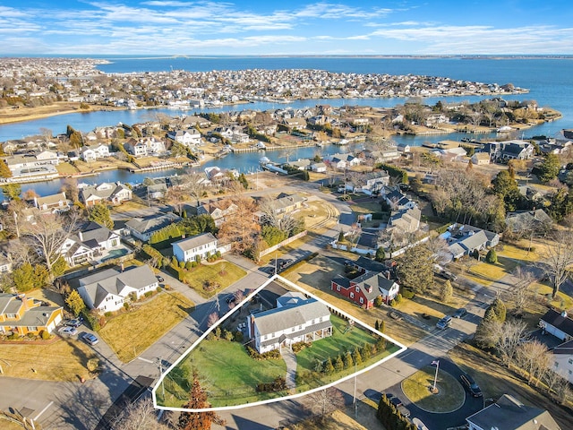 aerial view featuring a residential view and a water view