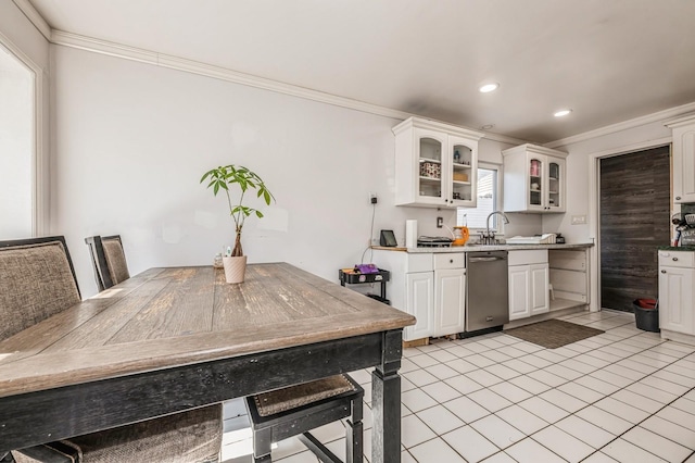 kitchen featuring dishwasher, glass insert cabinets, white cabinetry, and crown molding