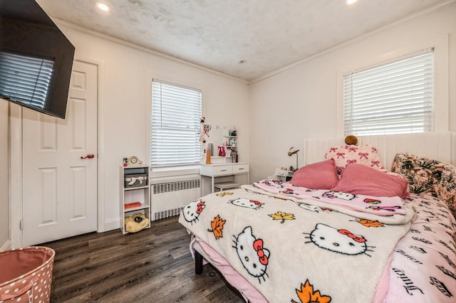 bedroom with ornamental molding, recessed lighting, radiator, and dark wood-style floors