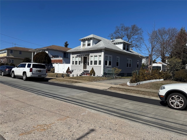 view of front of home with fence