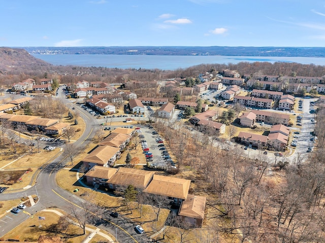 bird's eye view with a water view and a residential view