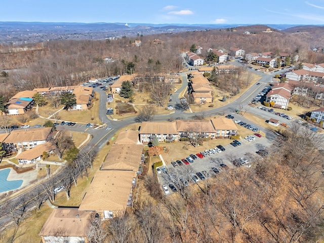 aerial view featuring a mountain view and a residential view