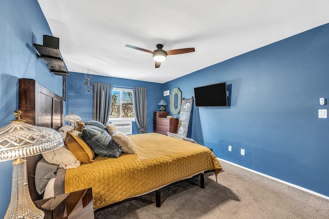 bedroom featuring carpet, baseboards, ceiling fan, and cooling unit