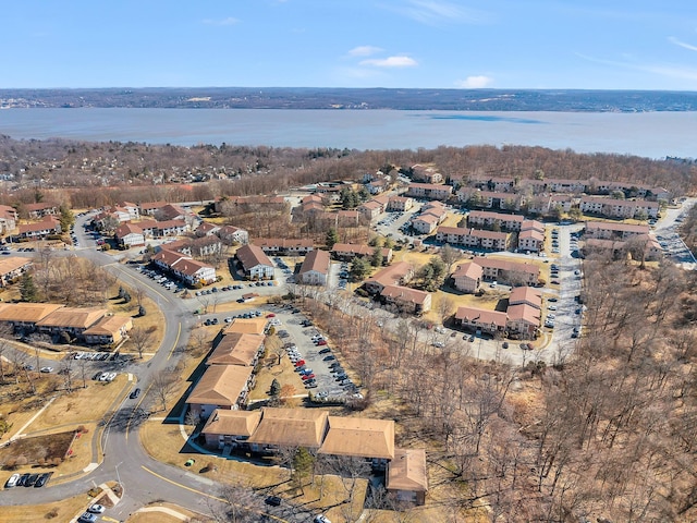 aerial view featuring a residential view and a water view