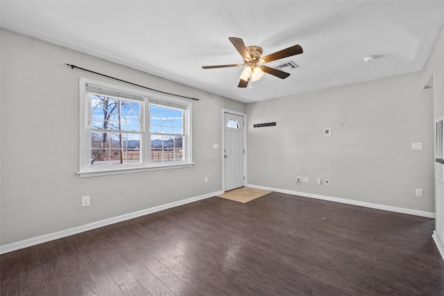 entrance foyer featuring visible vents, ceiling fan, baseboards, and wood finished floors