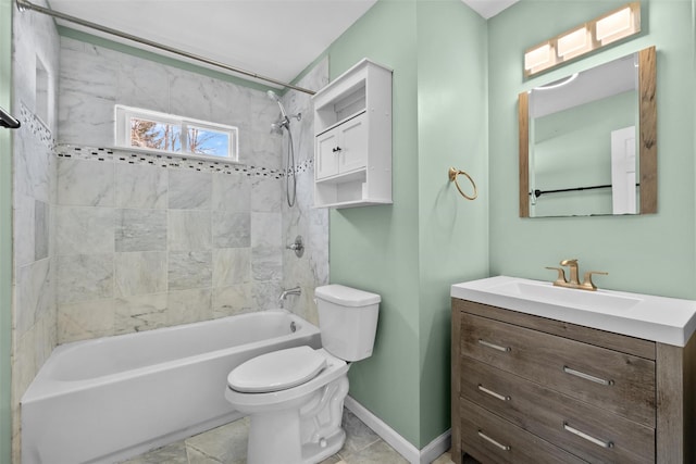 bathroom featuring baseboards, vanity, toilet, and bathing tub / shower combination