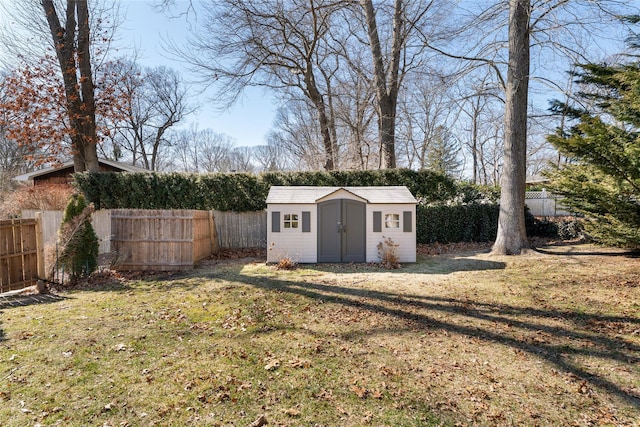 view of shed featuring a fenced backyard