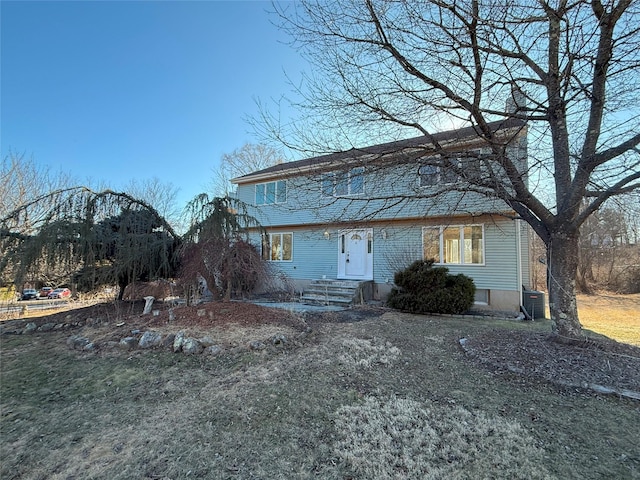 view of front of property with cooling unit