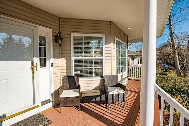 wooden terrace with a porch