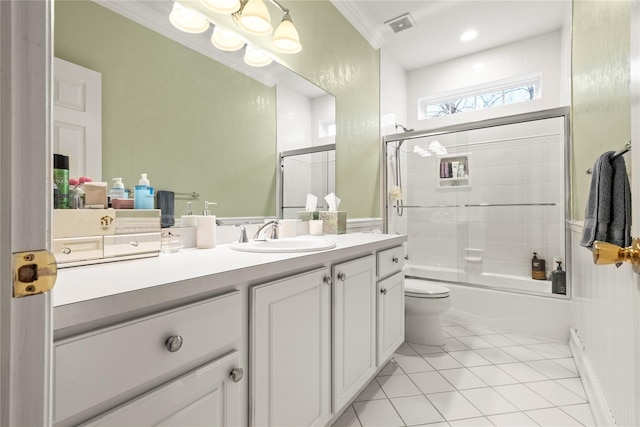 full bathroom with visible vents, toilet, ornamental molding, vanity, and tile patterned floors