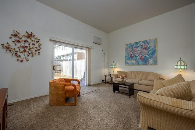 living area featuring carpet and baseboards