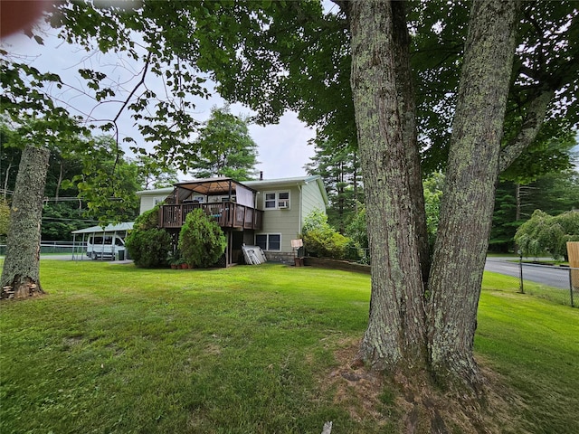 view of yard with a deck