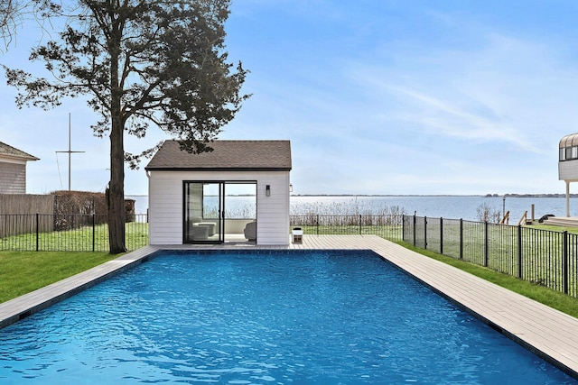 view of pool with a yard, a fenced in pool, a fenced backyard, and a water view