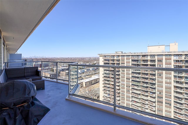 balcony featuring a city view