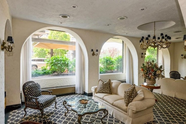 interior space with plenty of natural light and a notable chandelier