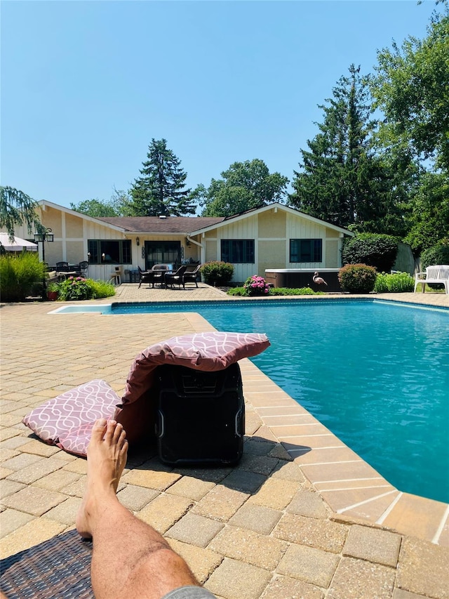 outdoor pool featuring a patio area