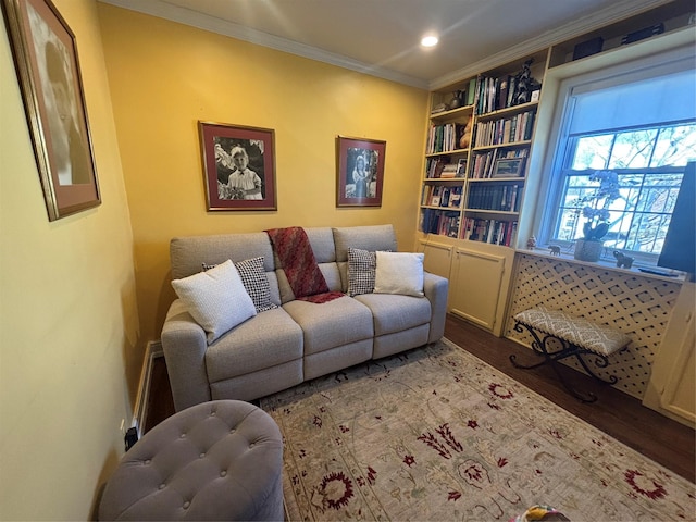 interior space featuring recessed lighting, wood finished floors, and crown molding