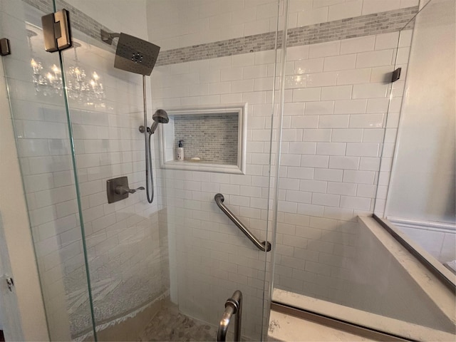 full bath featuring a shower stall