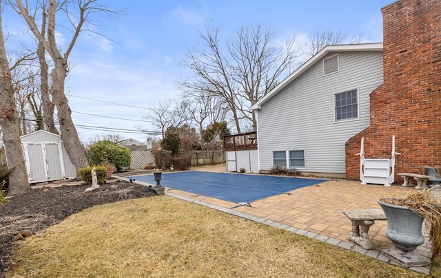 23 Franko Ln, Setauket, NY 11733 - view of pool with a storage unit and a patio area