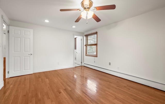23 Franko Ln, Setauket, NY 11733 - unfurnished bedroom featuring baseboard heating, light wood-type flooring, recessed lighting, and a ceiling fan